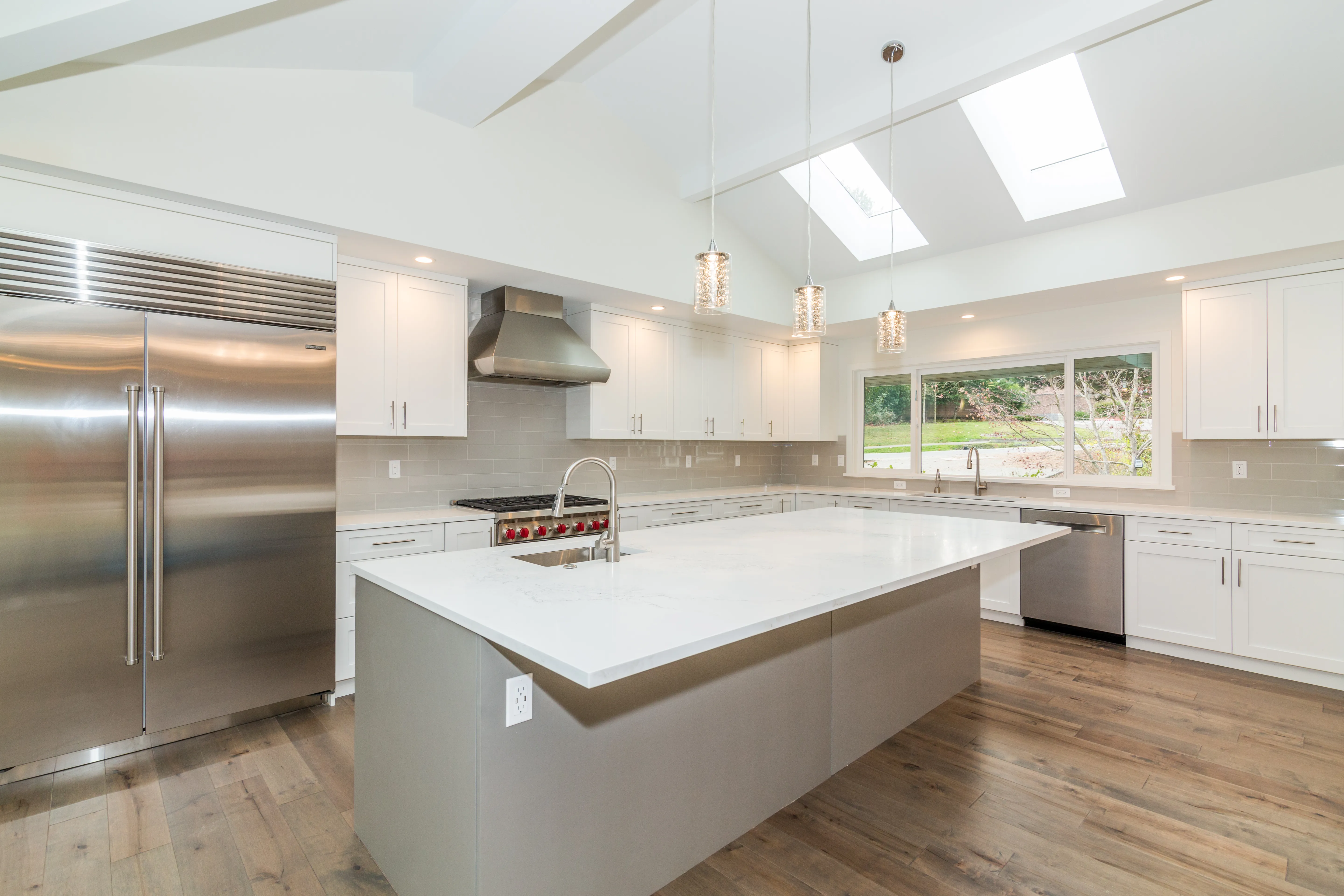 Bellevue addition kitchen with warm wood tones.